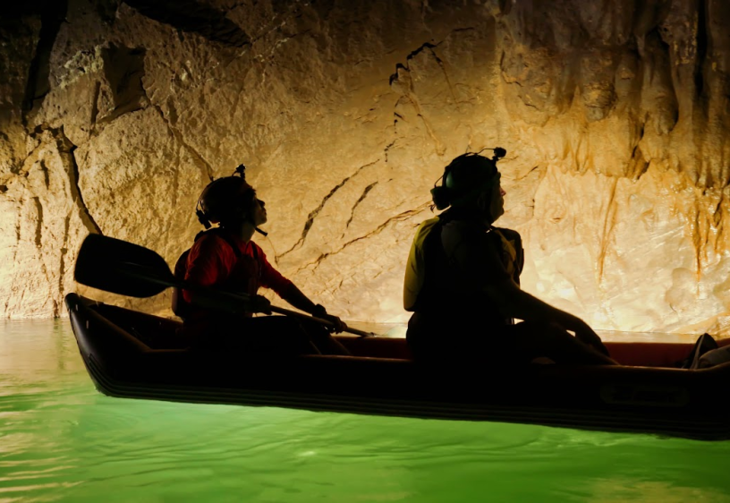 Paddling a boat in a 2-million-year-old cave.