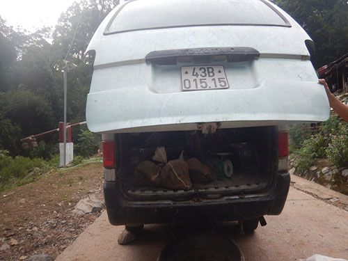 A car with its trunk open
Description automatically generated